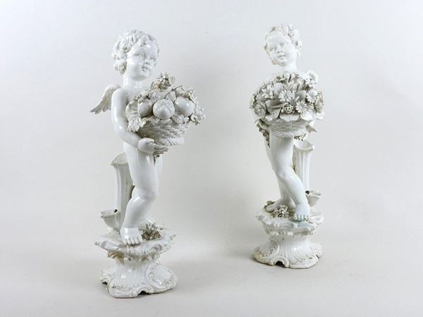 A Pair of Pottery Figural Groups